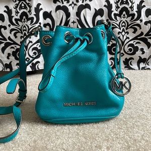 Teal Michael Kors Jules leather bucket crossbody